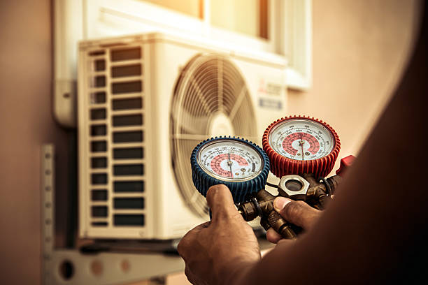 Professional Air Conditioning Service technician working in Linden, AZ
